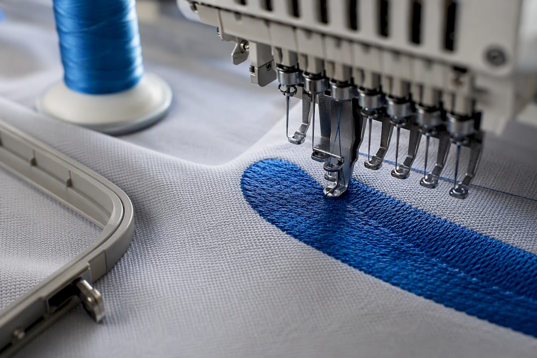 Raised embroidery stitches on polo fabric
